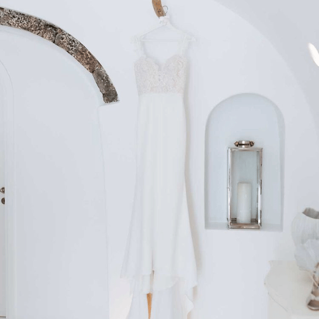 A stunning Greek wedding captured at Erossea Villa in Santorini, showcasing love and celebration against a beautiful backdrop