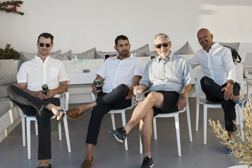Friends enjoying a private villa terrace in Santorini